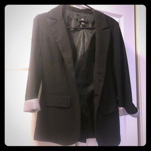 Black blazer with pinstriped cuffs
